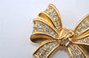 Authentic NINA RICCI Vintage Rhinestone Ribbon Brooch Accessory Gold 0899J