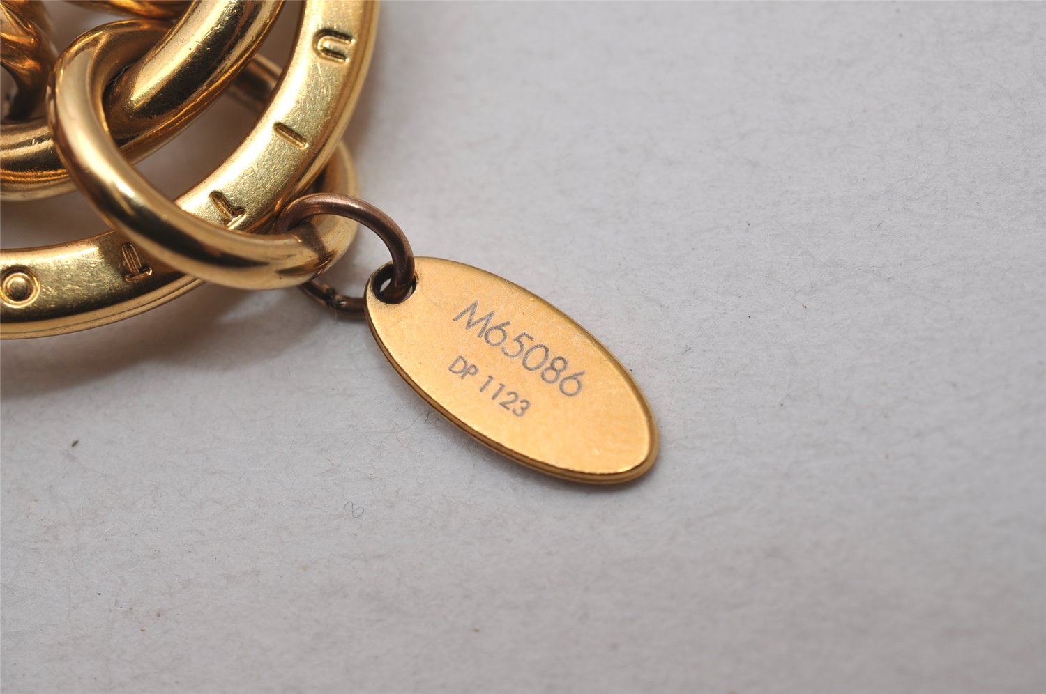 Authentic Louis Vuitton Porte Cles Maison Charm Key Ring Gold M65086 LV 2842I