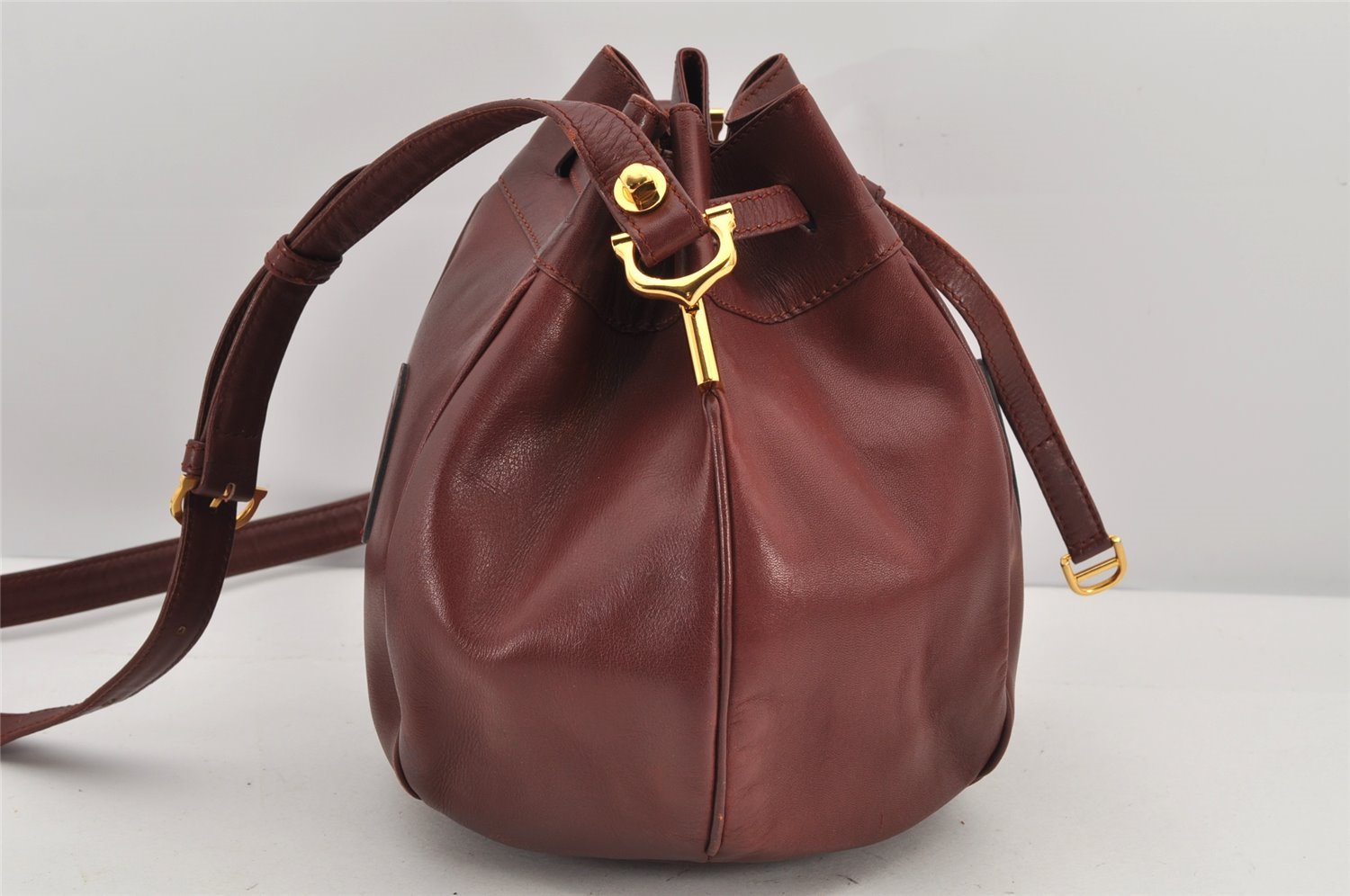 Authentic Cartier Must de Cartier Leather Shoulder Drawstring Bag Bordeaux 2902K