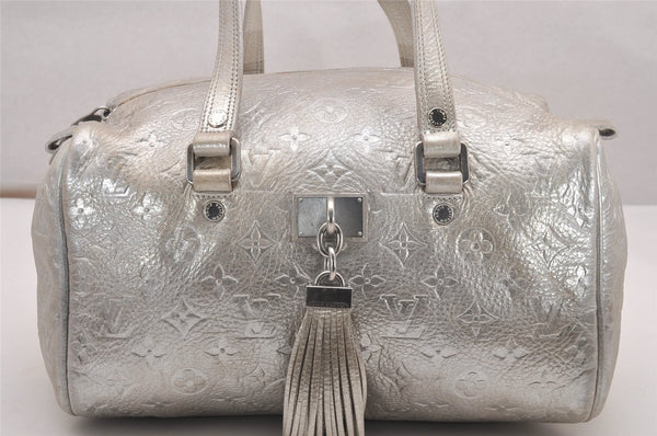 Authentic Louis Vuitton Monogram Shimmer Comete Hand Bag Silver M95817 LV 4851J