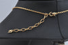 Authentic NINA RICCI Gold Tone Ribbon Rhinestone Chain Pendant Necklace  8586J