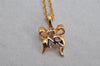 Authentic NINA RICCI Gold Tone Ribbon Rhinestone Chain Pendant Necklace  8586J