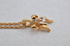 Authentic NINA RICCI Gold Tone Ribbon Rhinestone Chain Pendant Necklace  8586J