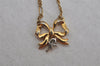 Authentic NINA RICCI Gold Tone Ribbon Shaped Chain Pendant Necklace Junk 8620J