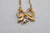 Authentic NINA RICCI Gold Tone Ribbon Shaped Chain Pendant Necklace Junk 8620J