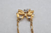 Authentic NINA RICCI Gold Tone Ribbon Shaped Chain Pendant Necklace Junk 8620J