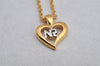 Authentic NINA RICCI Gold Tone Heart Shaped Chain Pendant Necklace  8632J