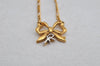 Authentic NINA RICCI Gold Tone Ribbon Shaped Chain Pendant Necklace  8639J