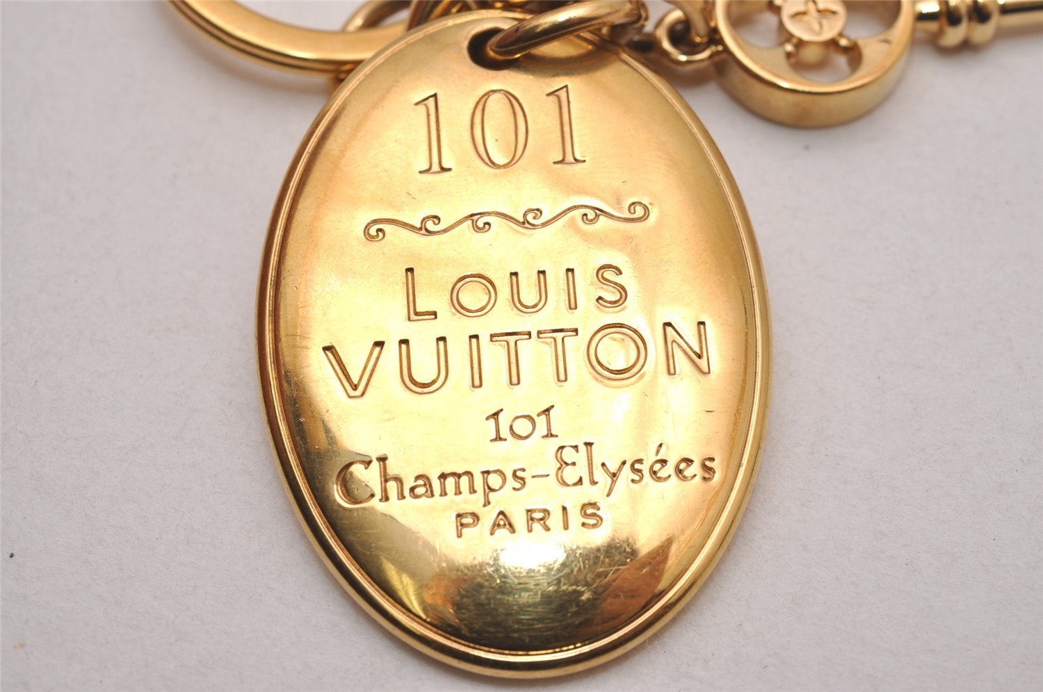 Authentic Louis Vuitton Porte Cles Maison Charm Key Ring Gold M65086 LV 2842I