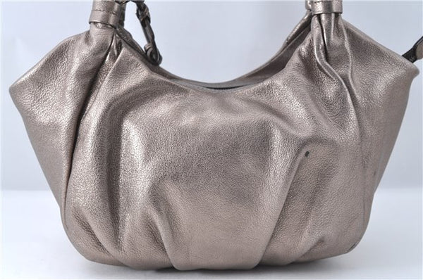 Authentic Ferragamo Gancini Tassel Leather Shoulder Bag Silver J1984