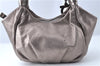 Authentic Ferragamo Gancini Tassel Leather Shoulder Bag Silver J1984