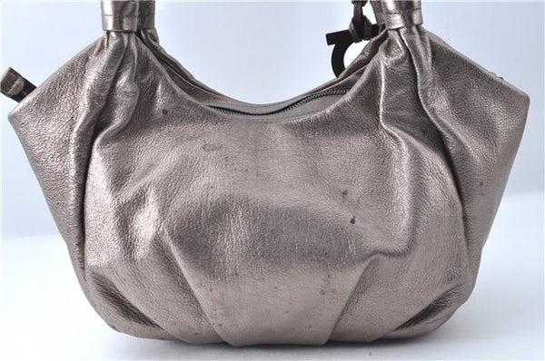 Authentic Ferragamo Gancini Tassel Leather Shoulder Bag Silver J1984