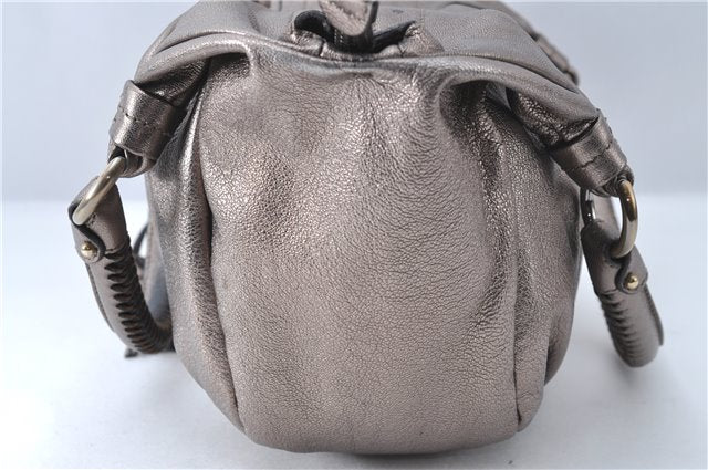 Authentic Ferragamo Gancini Tassel Leather Shoulder Bag Silver J1984