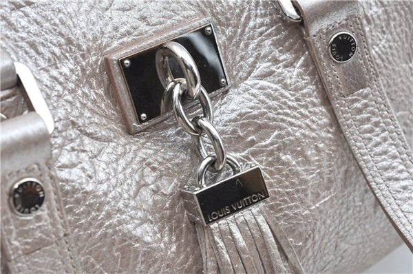 Authentic Louis Vuitton Monogram Shimmer Comete Silver M95817 LV J8979