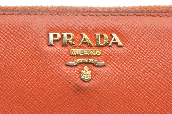 Authentic PRADA Saffiano Leather Round Zip Long Wallet Purse Orange K5346