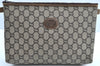 Authentic GUCCI GG Plus Clutch Hand Bag Purse GG PVC Leather Brown K5428